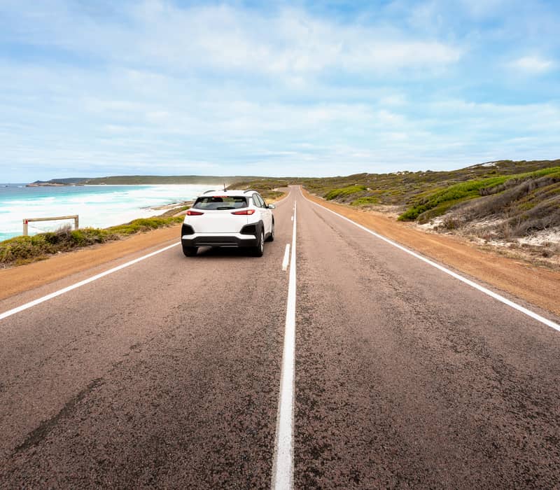Car driving in Great Ocean Road in Victoria, Australia_shutterstock_1398313055.jpg